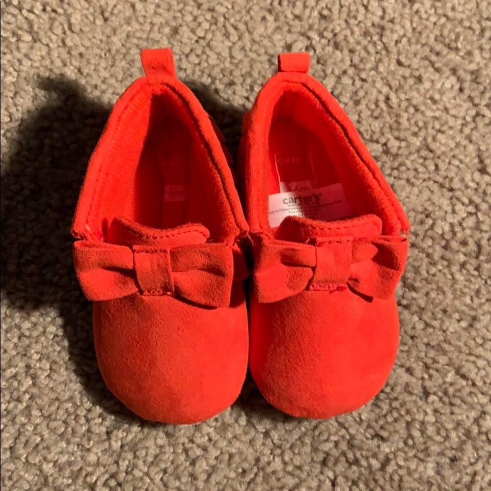 Infant size 3-6 red shoes.